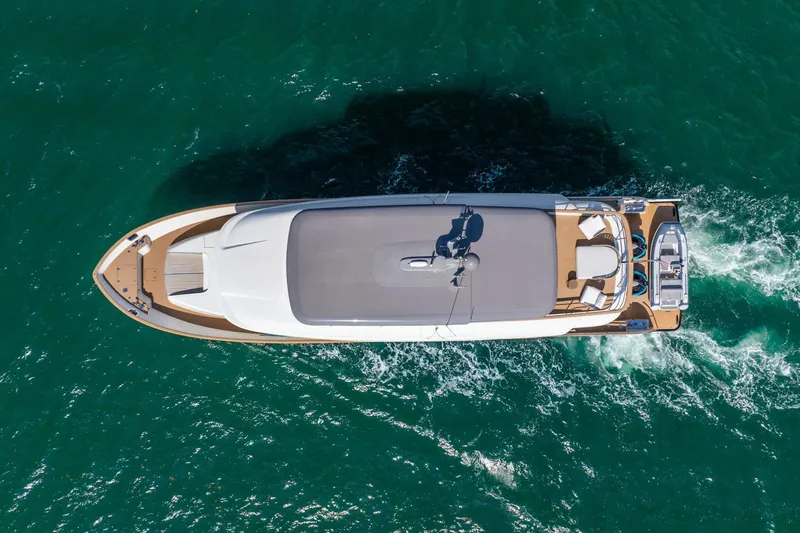 Lady Sadie Yacht Photos Pics Aerial view of 2019 Van der Valk LeVen 90 yacht cruising on turquoise water.