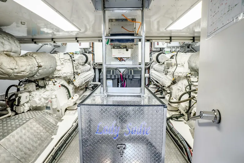 Lady Sadie Yacht Photos Pics Engine room of 2019 Van der Valk LeVen 90 yacht, featuring dual engines and metallic surfaces.