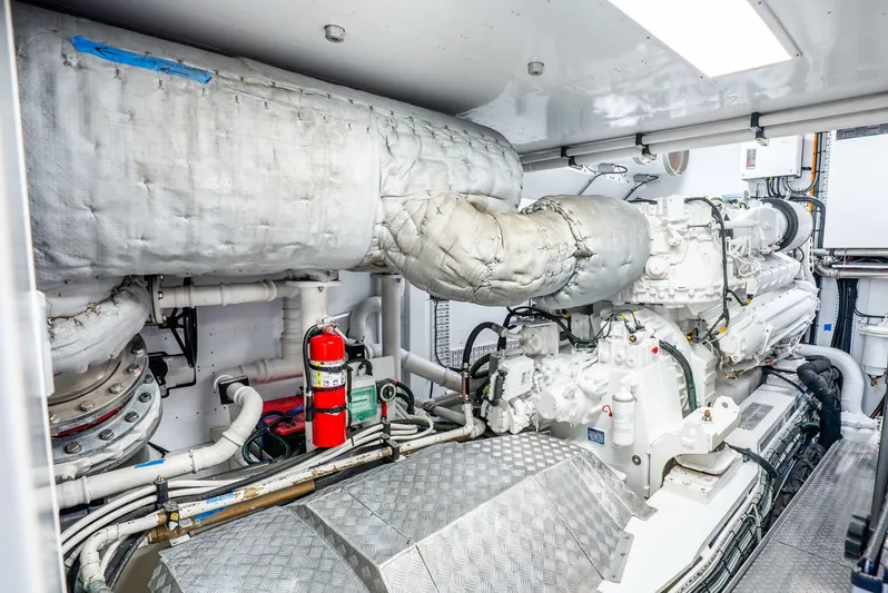 Lady Sadie Yacht Photos Pics Engine room of 2019 Van der Valk LeVen 90 yacht, featuring insulated components and fire extinguisher.