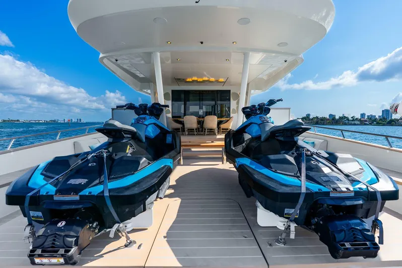 Lady Sadie Yacht Photos Pics Luxury yacht Van der Valk LeVen 90 (2019) with jet skis on deck, ocean view.