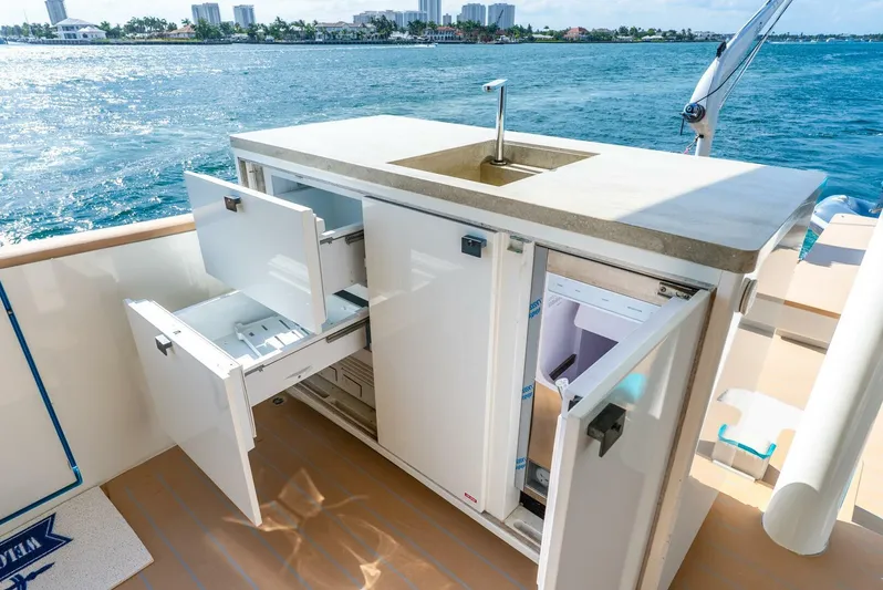 Lady Sadie Yacht Photos Pics Outdoor kitchen on 2019 Van der Valk LeVen 90 yacht with sink and storage, ocean view.