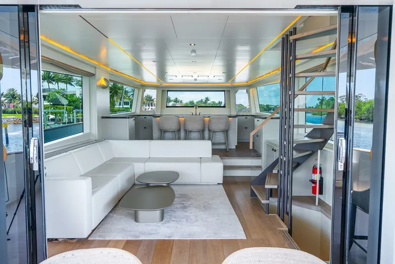 Lady Sadie Yacht Photos Pics Luxurious interior of 2019 Van der Valk LeVen 90 yacht with modern seating and elegant design.