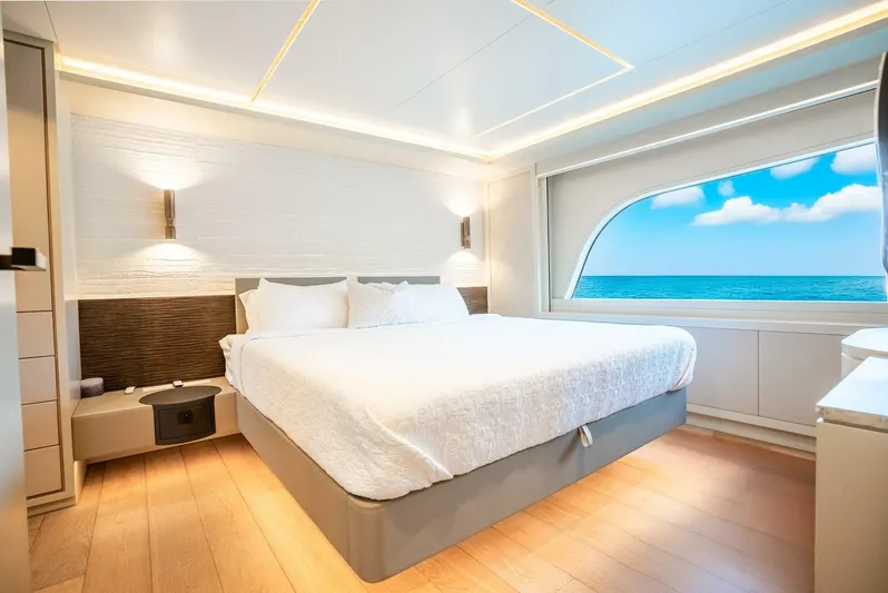 Lady Sadie Yacht Photos Pics Luxurious bedroom interior of 2019 Van der Valk LeVen 90 yacht with ocean view.