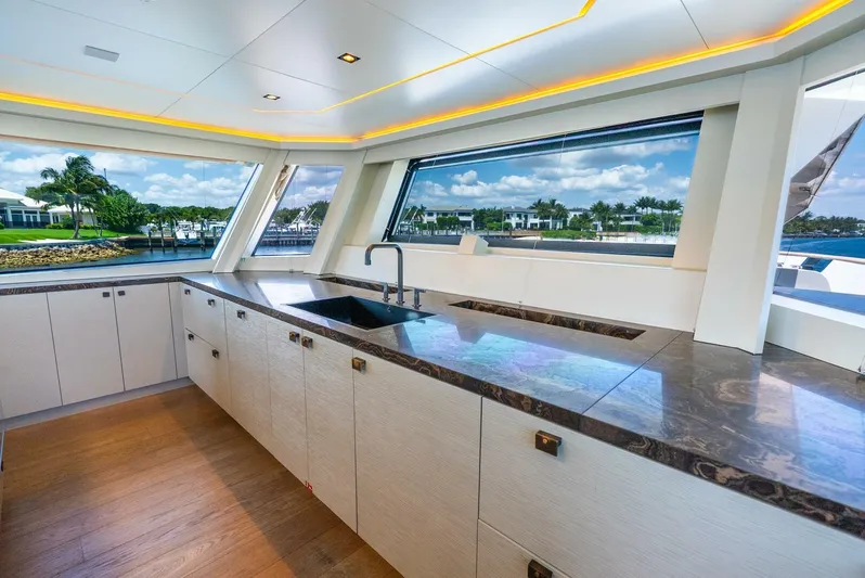 Lady Sadie Yacht Photos Pics Luxurious 2019 Van der Valk LeVen 90 yacht kitchen with sleek countertops and panoramic windows.