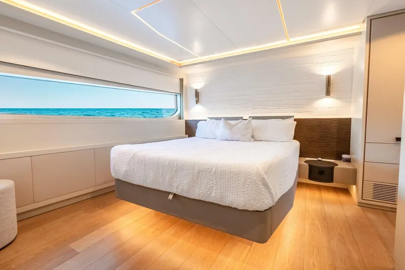 Lady Sadie Yacht Photos Pics Luxurious bedroom interior of 2019 Van der Valk LeVen 90 yacht with ocean view.