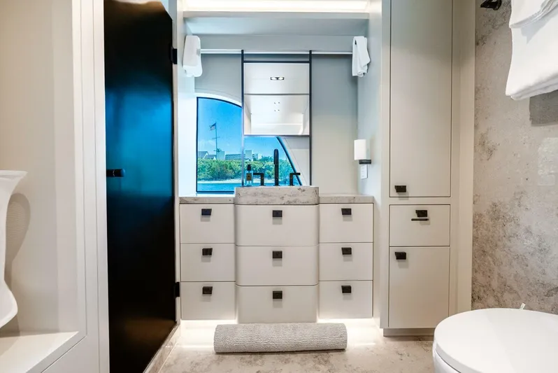 Lady Sadie Yacht Photos Pics Luxurious bathroom interior on 2019 Van der Valk LeVen 90 yacht, featuring modern design and elegant fixtures.