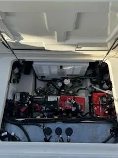  Yacht Photos Pics 2023 Boston Whaler 325 Conquest engine compartment with visible components and wiring.