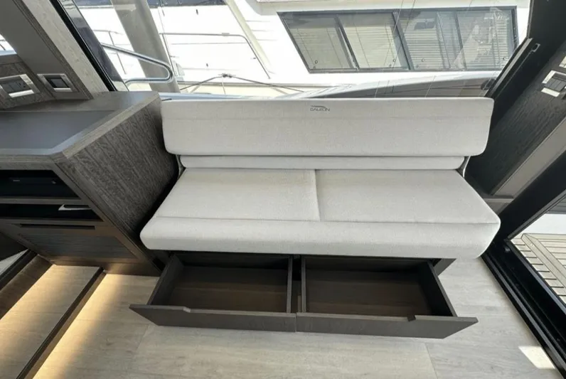 The Good Life Yacht Photos Pics Interior of 2024 Galeon 510 Sky with seating and storage.
