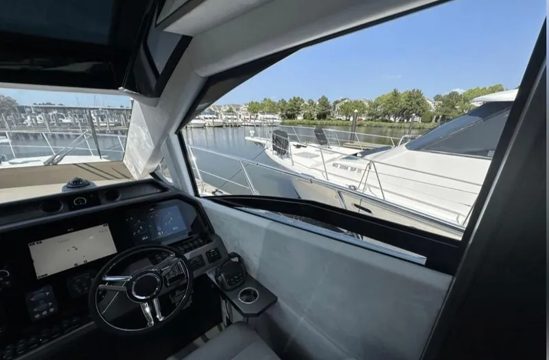 The Good Life Yacht Photos Pics Interior view of 2024 Galeon 510 Sky yacht at marina.