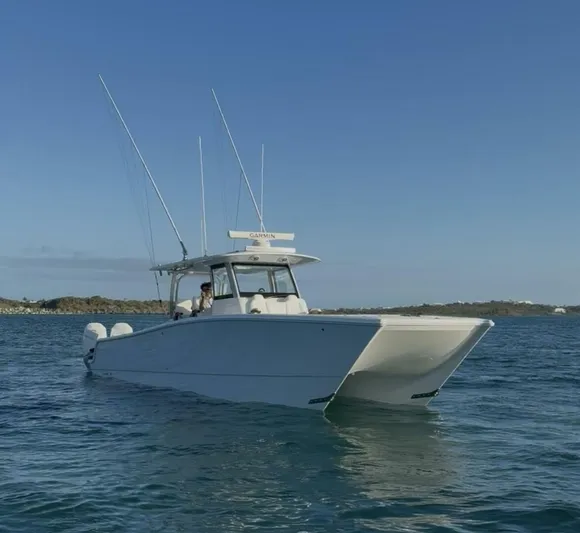  Yacht Photos Pics 2026 Freeman 38 boat on calm water under clear blue sky.