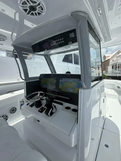  Yacht Photos Pics Modern Freeman 38 boat cockpit with advanced navigation systems, 2026 model.