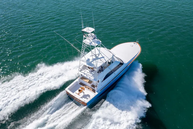 Emeritus Yacht Photos Pics Aerial view of 2001 Viking 61 Convertible yacht cruising on open water.