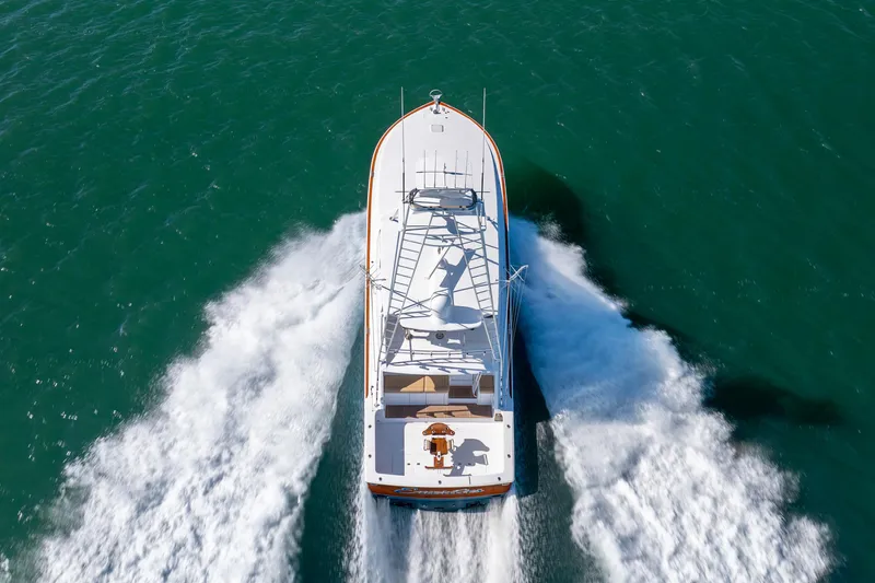 Emeritus Yacht Photos Pics Aerial view of 2001 Viking 61 Convertible yacht cruising on open water.