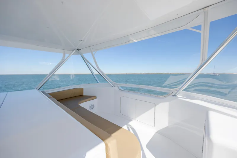 Emeritus Yacht Photos Pics 2001 Viking 61 Convertible yacht interior with ocean view and seating area.