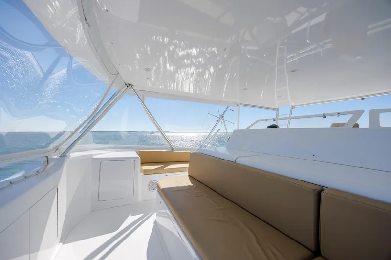 Emeritus Yacht Photos Pics Interior view of 2001 Viking 61 Convertible yacht with ocean backdrop.