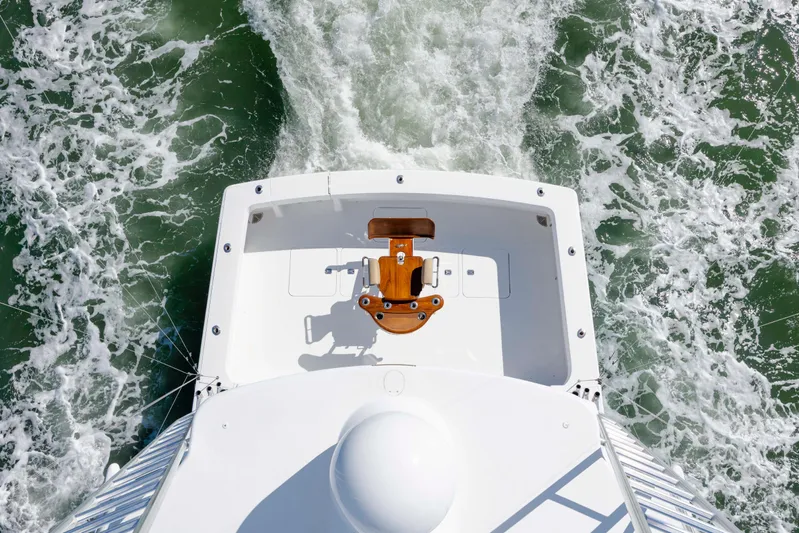 Emeritus Yacht Photos Pics Aerial view of 2001 Viking 61 Convertible yacht cruising through ocean waves.