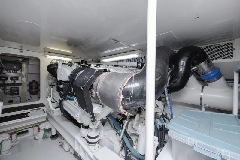 Emeritus Yacht Photos Pics Engine room of 2001 Viking 61 Convertible yacht, showcasing machinery and components.