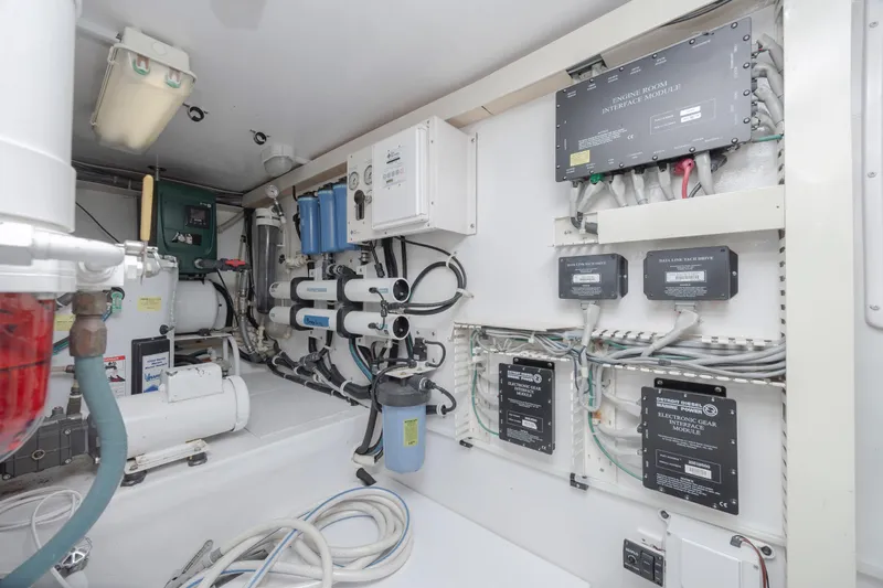 Emeritus Yacht Photos Pics Engine room of 2001 Viking 61 Convertible yacht with electronic modules and filtration system.
