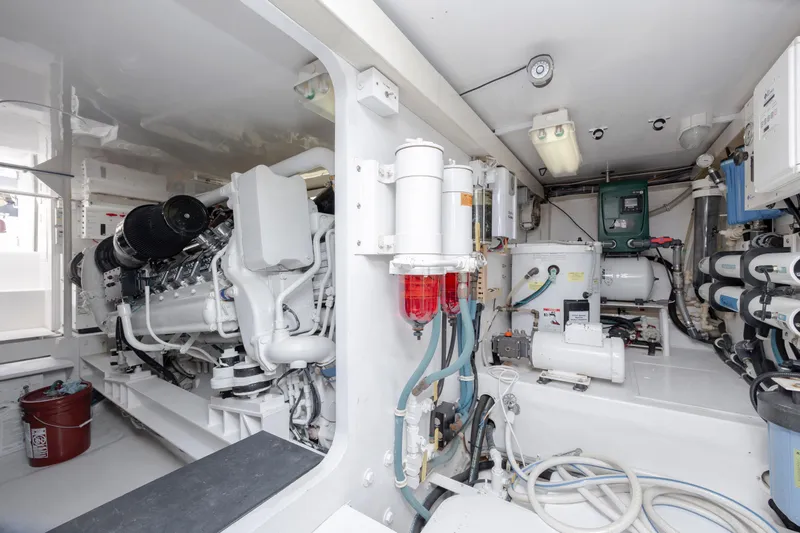 Emeritus Yacht Photos Pics Engine room of 2001 Viking 61 Convertible yacht, showcasing machinery and equipment.