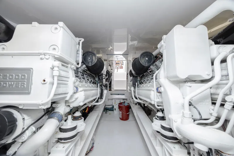 Emeritus Yacht Photos Pics Engine room of 2001 Viking 61 Convertible yacht, showcasing dual powerful engines.