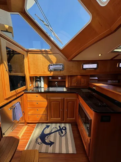 Grand Baby Yacht Photos Pics Luxurious 2018 Legacy 42 yacht interior with wooden cabinetry and skylight.