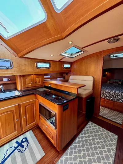 Grand Baby Yacht Photos Pics Luxurious 2018 Legacy 42 yacht interior with wood finish and modern amenities.