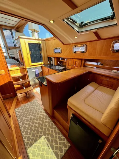 Grand Baby Yacht Photos Pics Luxurious interior of 2018 Legacy 42 yacht with wood finish and skylight.