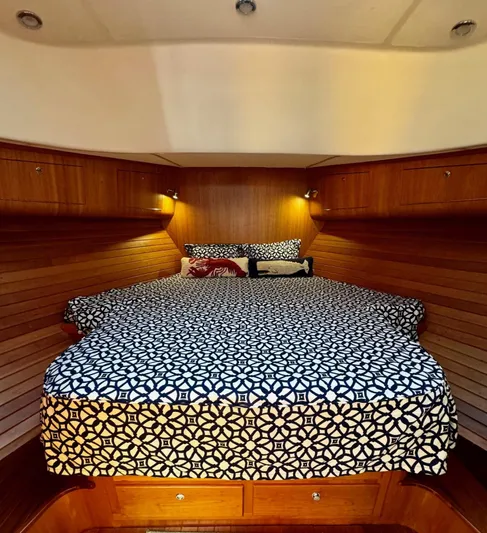 Grand Baby Yacht Photos Pics Cozy cabin interior of 2018 Legacy 42 yacht with patterned bedding.