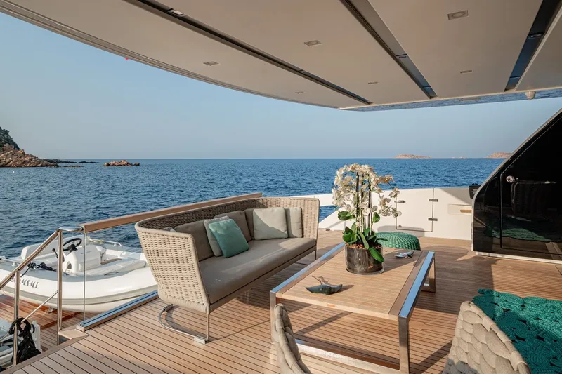 4leon Yacht Photos Pics Luxurious Navetta 33 yacht deck with elegant seating, ocean view, and modern decor, 2026 model.