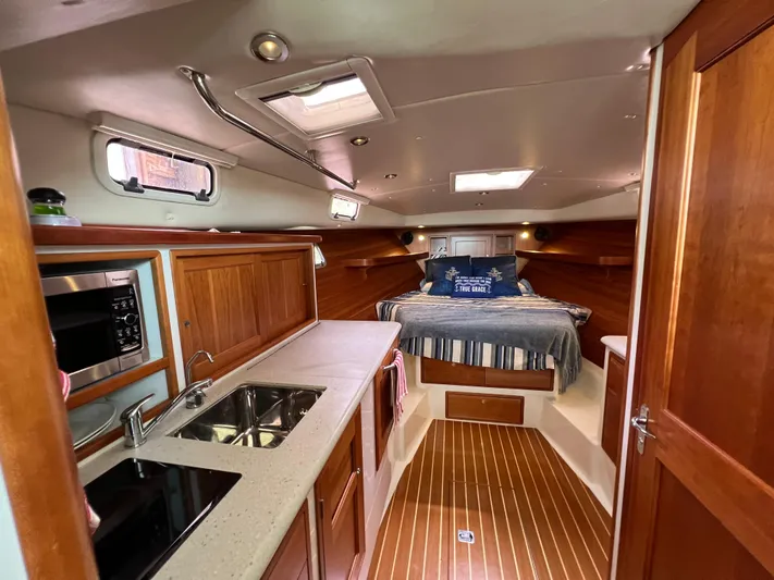 True Grace Yacht Photos Pics Interior of 2011 MJM 36Z yacht with kitchen and cozy sleeping area.