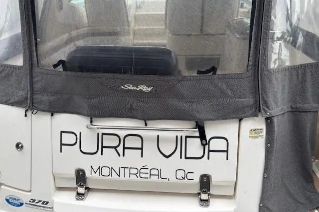 Pura Vida Yacht Photos Pics 2012 Sea Ray 370 Sundancer boat with "Pura Vida" and "Montréal, Qc" text on the stern.