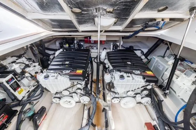 Pura Vida Yacht Photos Pics Engine room of 2012 Sea Ray 370 Sundancer with dual engines and mechanical components.