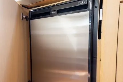 Pura Vida Yacht Photos Pics Compact stainless steel refrigerator inside a 2012 Sea Ray 370 Sundancer yacht.