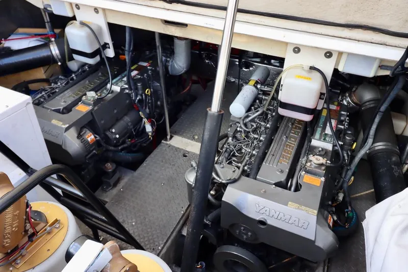 Cool Change Yacht Photos Pics Engine room of 2006 Regal Commodore 4460 with dual Yanmar engines.