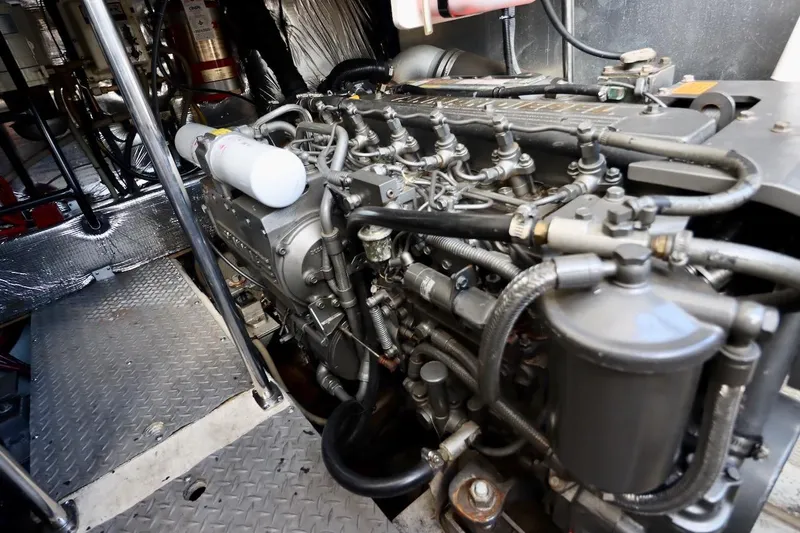 Cool Change Yacht Photos Pics Engine room of 2006 Regal Commodore 4460 yacht, showcasing detailed mechanical components.