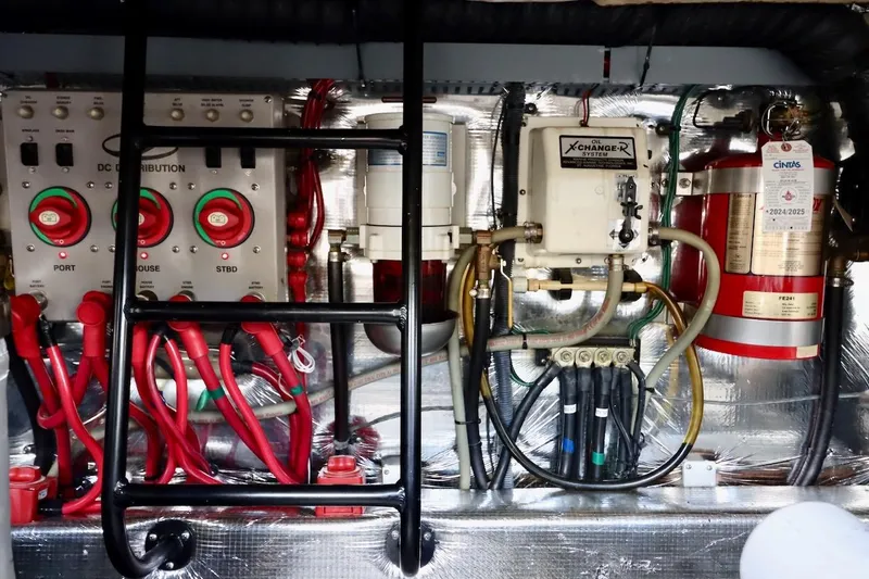 Cool Change Yacht Photos Pics Engine room of 2006 Regal Commodore 4460 with control panels and wiring.