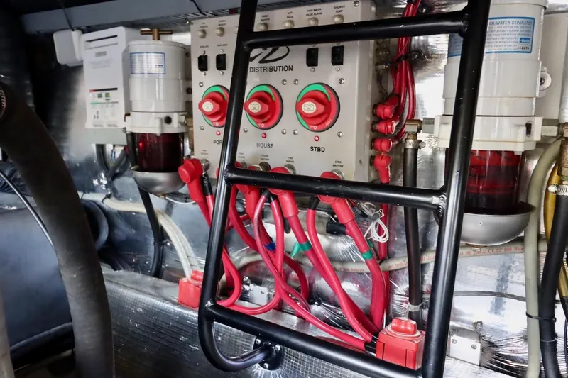 Cool Change Yacht Photos Pics Engine room of 2006 Regal Commodore 4460 with electrical distribution panel and wiring.