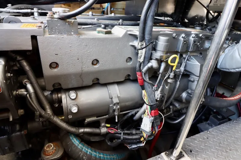 Cool Change Yacht Photos Pics Engine compartment of a 2006 Regal Commodore 4460 with visible wiring and components.