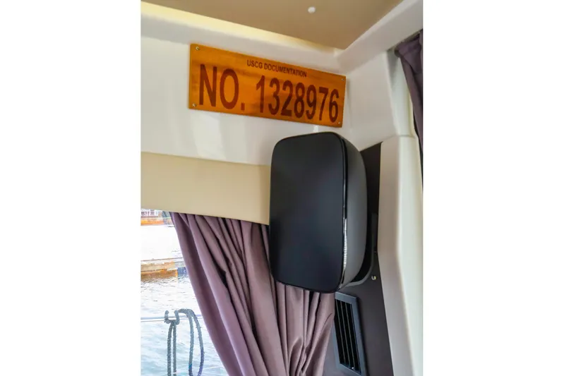 Tequila Little Time II Yacht Photos Pics Interior of 2015 Jeanneau NC 14 with USCG documentation number displayed.