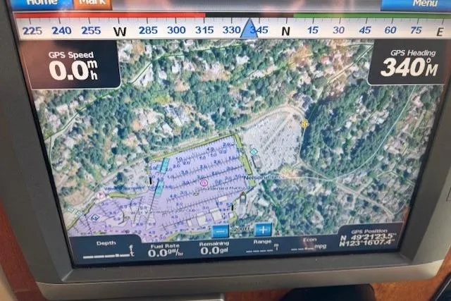 Fish Tank Yacht Photos Pics GPS navigation screen on a 2013 Ranger Tugs R-31, showing map and speed details.