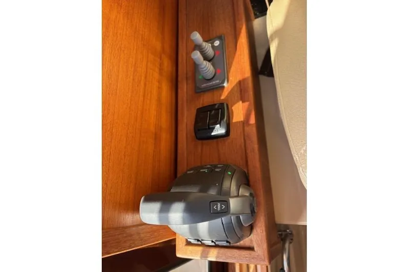 Fish Tank Yacht Photos Pics Control panel of a 2013 Ranger Tugs R-31 boat with joystick and switches.