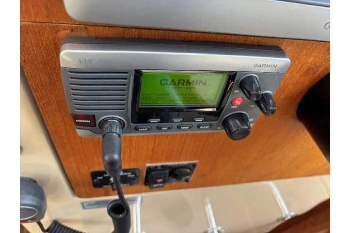 Fish Tank Yacht Photos Pics Garmin VHF 200 marine radio on 2013 Ranger Tugs R-31 boat dashboard.
