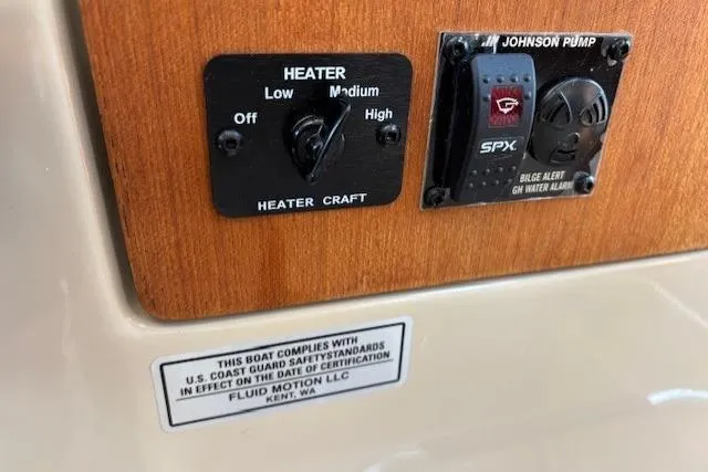 Fish Tank Yacht Photos Pics Control panel of a 2013 Ranger Tugs R-31 with heater and bilge alarm switches.