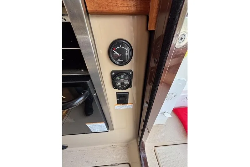 Fish Tank Yacht Photos Pics Control panel of 2013 Ranger Tugs R-31 boat with gauges and switches.