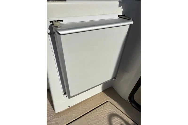 Fish Tank Yacht Photos Pics 2013 Ranger Tugs R-31 boat interior with closed storage compartment.