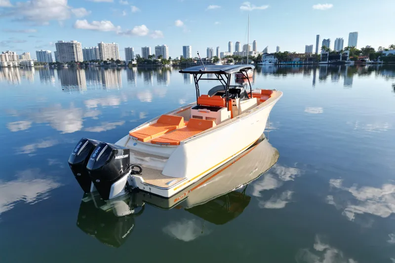  Yacht Photos Pics Lilybaeum Lipari 31 boat on calm water, city skyline in background, 2026 model.