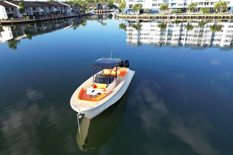  Yacht Photos Pics Lilybaeum Lipari 31 boat on calm water, reflecting waterfront buildings, 2026 model.
