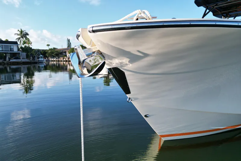  Yacht Photos Pics 2026 Lilybaeum Lipari 31 yacht anchored in serene waters, reflecting a clear blue sky.