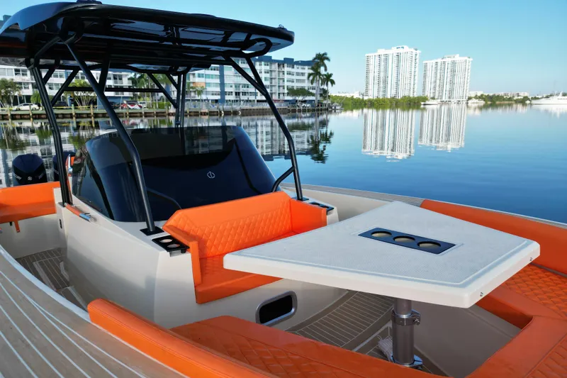  Yacht Photos Pics 2026 Lilybaeum Lipari 31 boat with orange seating, modern design, and waterfront view.