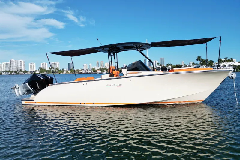  Yacht Photos Pics 2026 Lilybaeum Lipari 31 boat on water with city skyline background.
